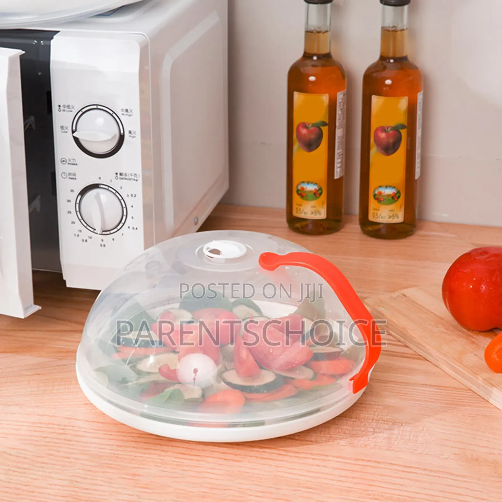 Transparent Microwave Cover With Rotatable Vent