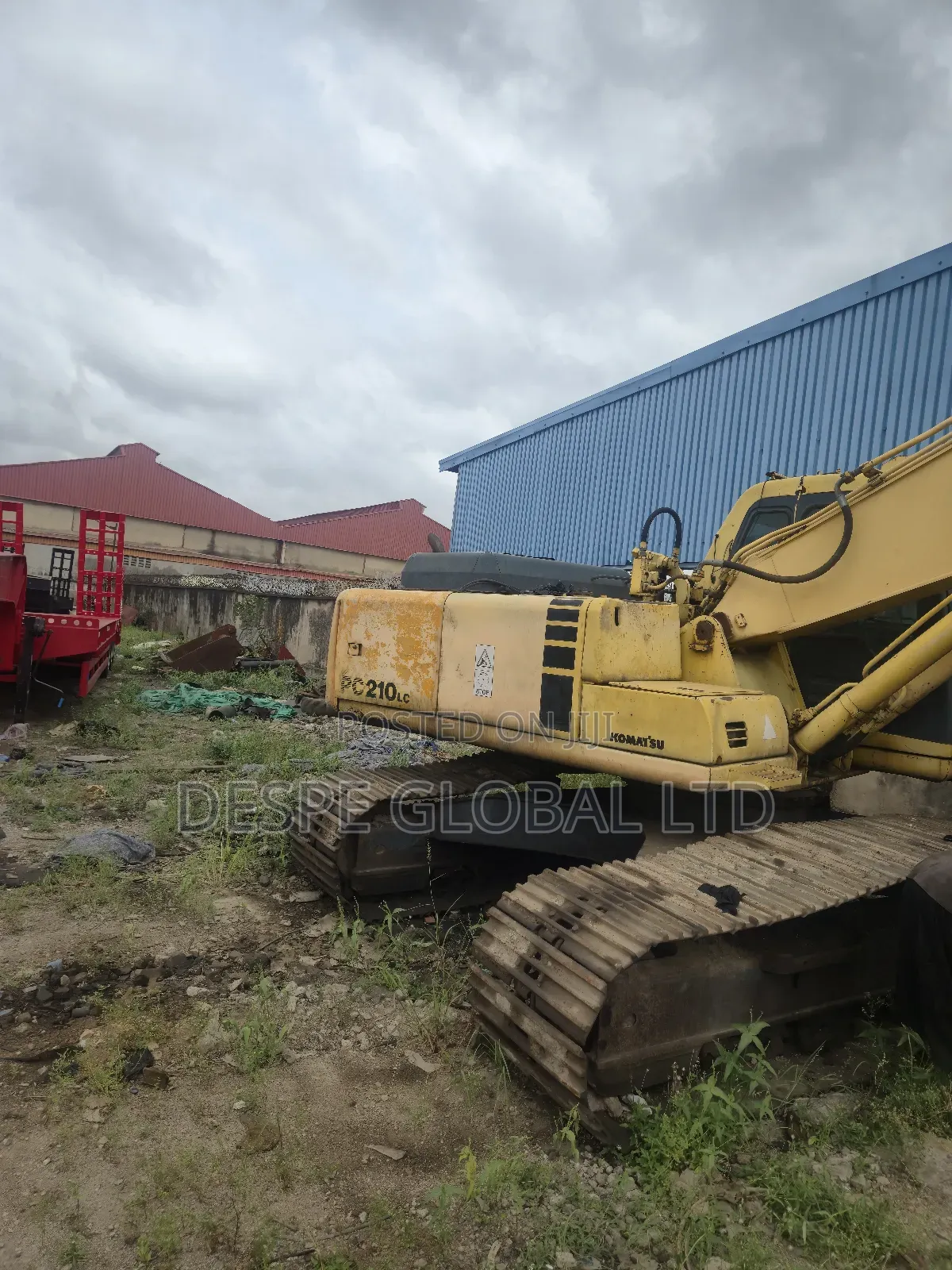 A Foreign Used Faulty Komatsu Pc210 Excavator