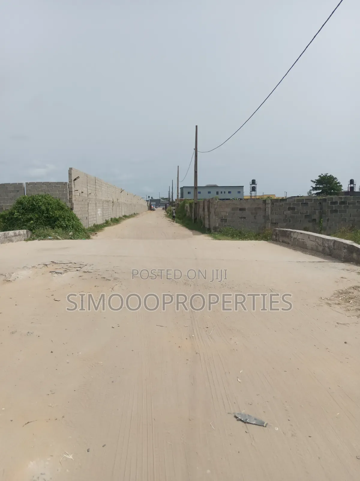 Half Plot of Land for Sale at Onishon, Fenced and Gated