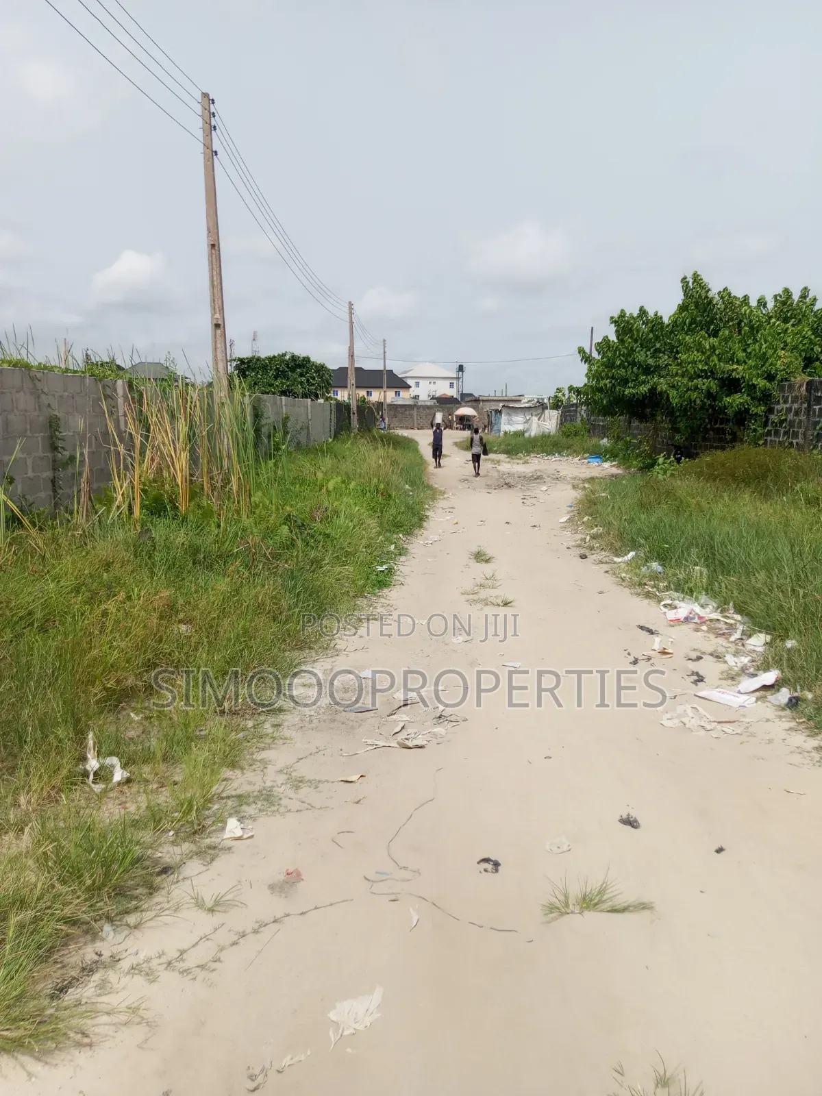 Half Plot of Land for Sale at Onishon, Fenced and Gated