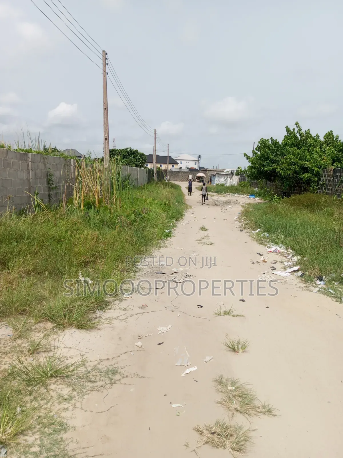 Half Plot of Land for Sale at Onishon, Fenced and Gated