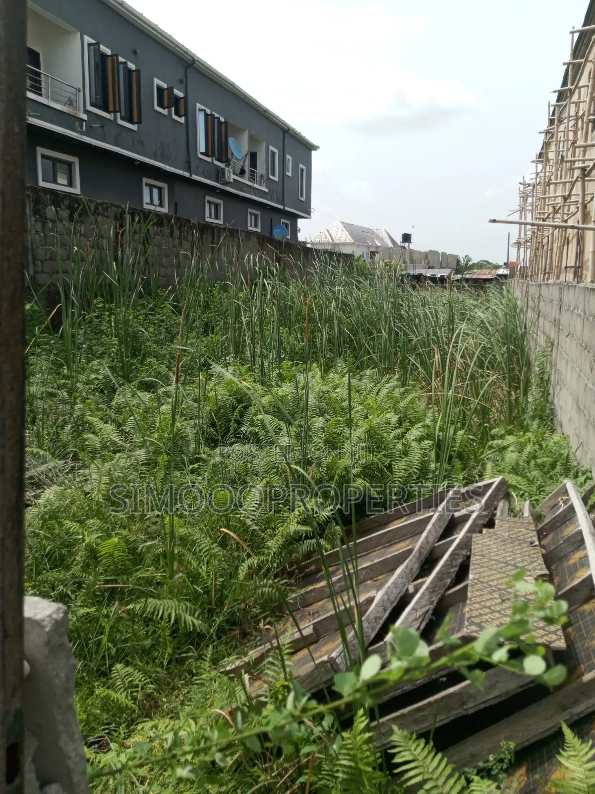 Half Plot of Land for Sale at Onishon, Fenced and Gated
