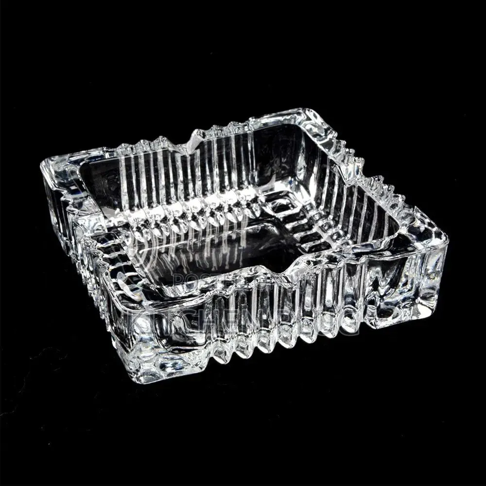 Square, Clear Glass Ashtray For Holding Cigarettes Or Cigars.