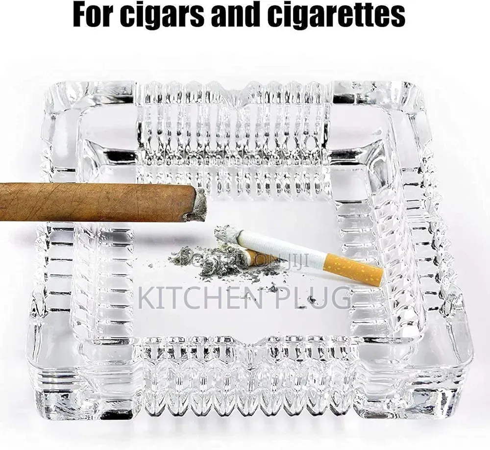 Square, Clear Glass Ashtray For Holding Cigarettes Or Cigars.