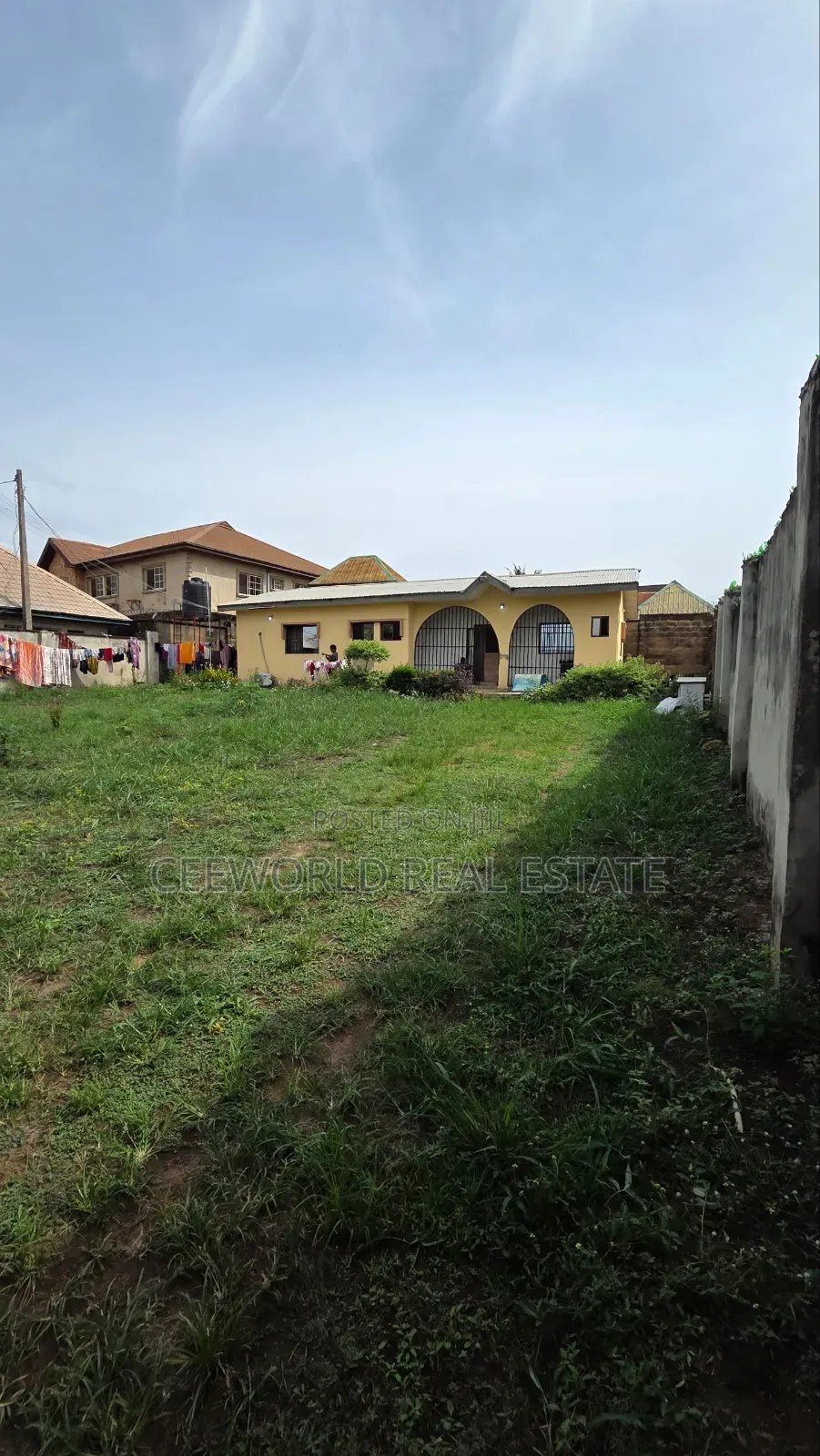 A Standard Plot Of Land At Progressive Estate On A Tarred Road
