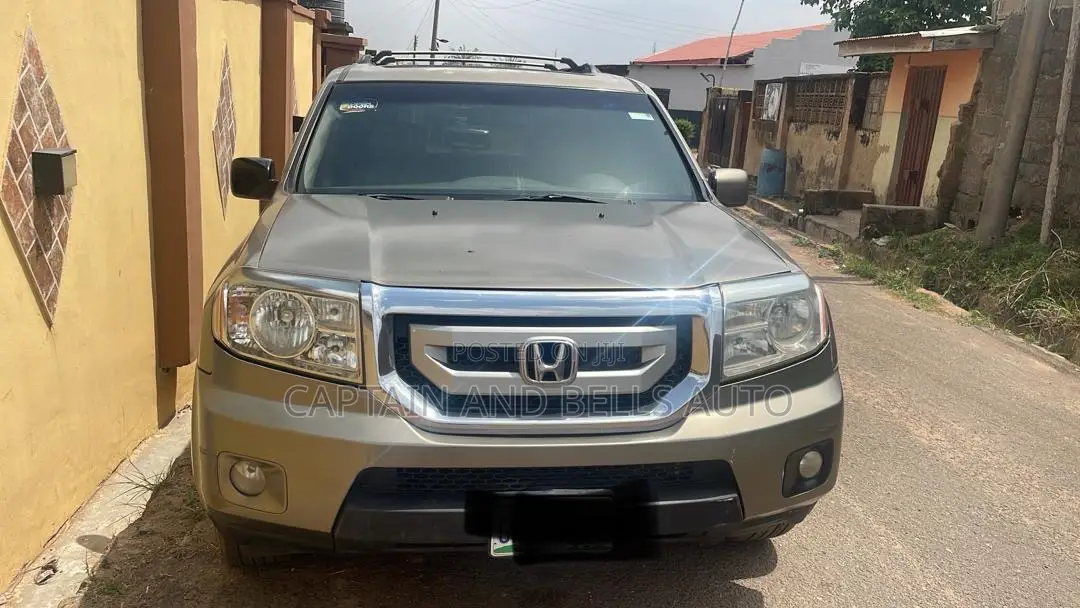 Honda Pilot LX 4dr SUV 4WD (3.5L 6cyl 5A) 2011 Brown