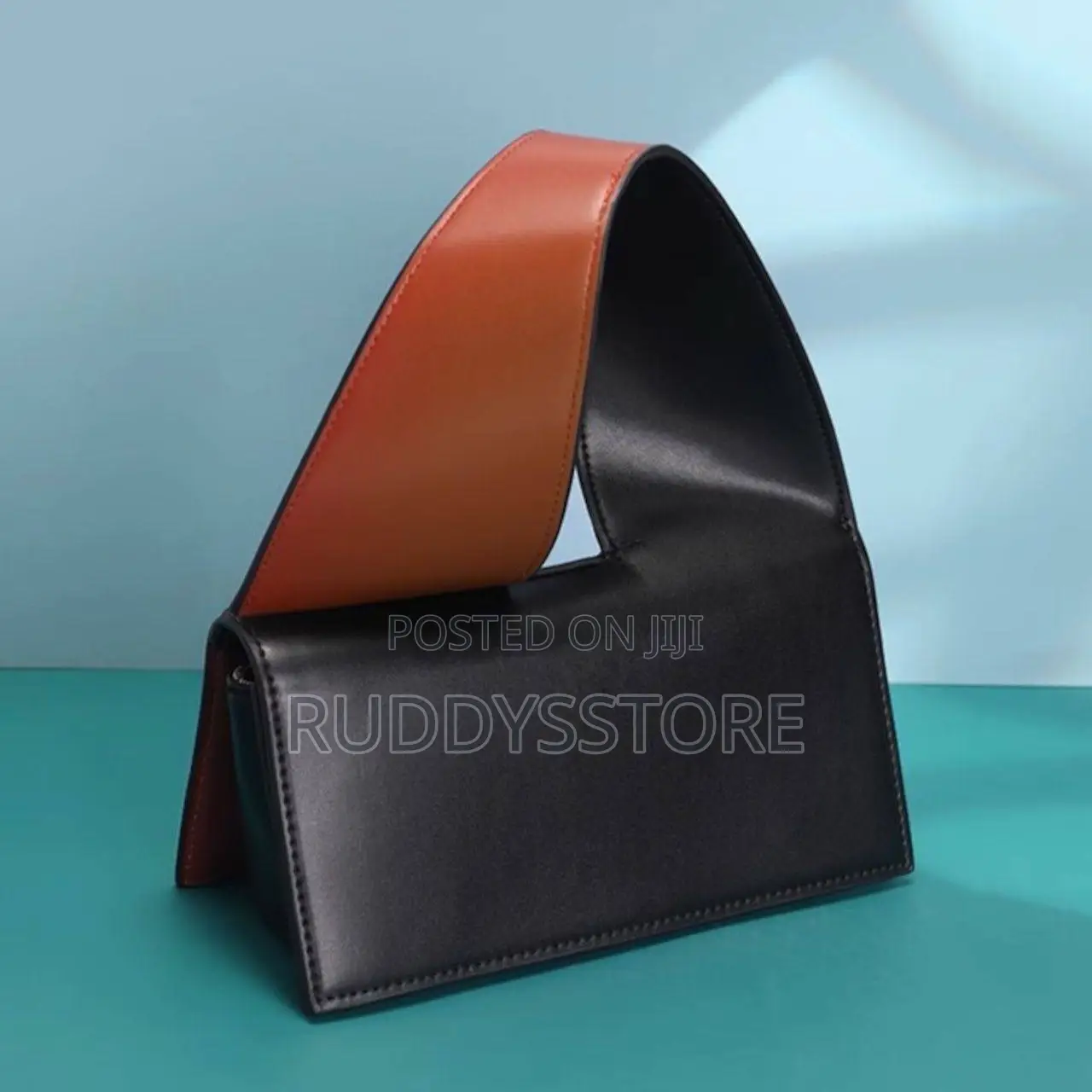 Roma Wide Twisted Handle Mini Bag.