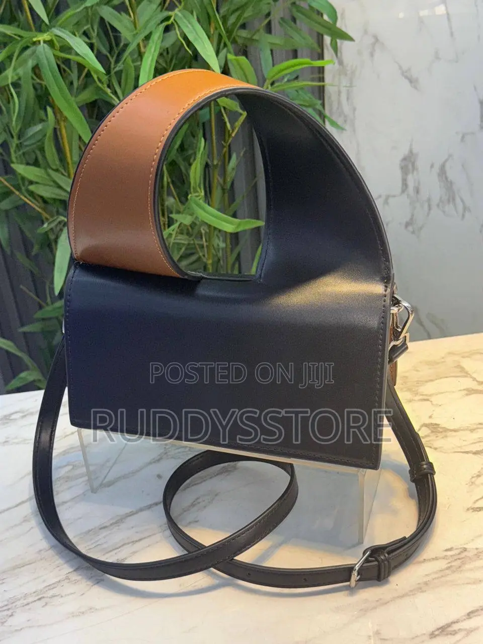 Roma Wide Twisted Handle Mini Bag.