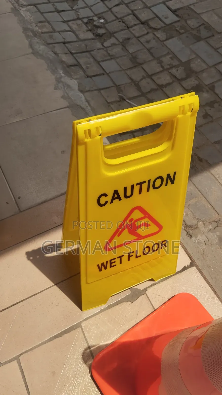 Yellow A-frame "Caution Wet Floor" Sign