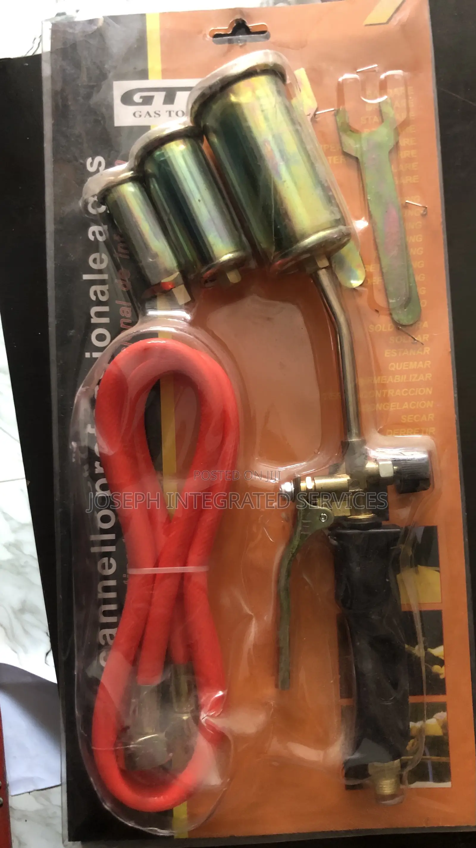 Gt Gas Blow Cutting Torch Kit With a Hose, Burner, and Nozzles.