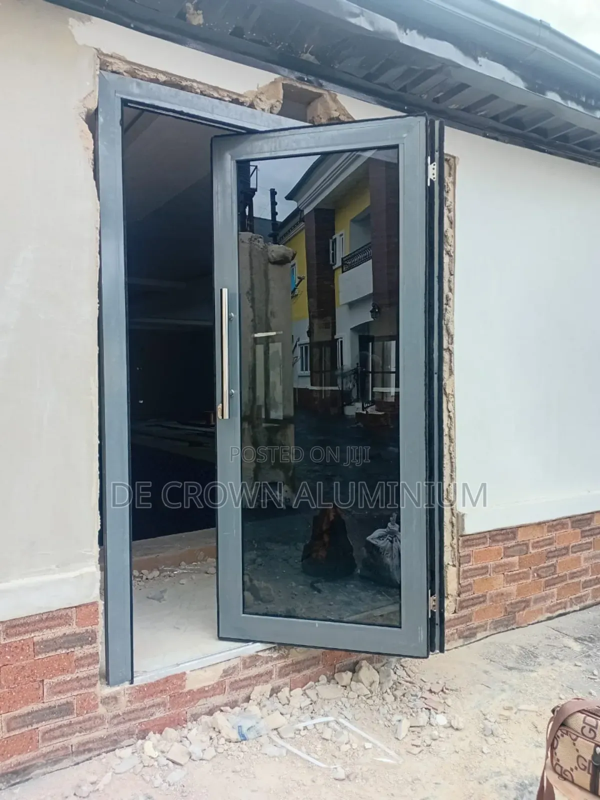 Premium Aluminium Collapsible Door With Dark Glass | Secure Modern