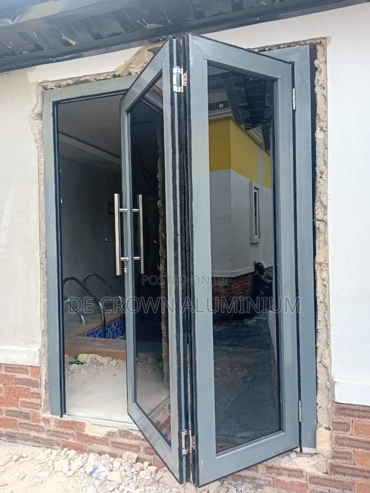 Premium Aluminium Collapsible Door With Dark Glass | Secure Modern