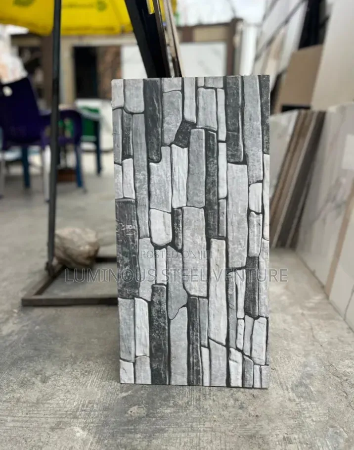 These Tiles Feature Vertical Ribs or Grooves That Create a Tactile,