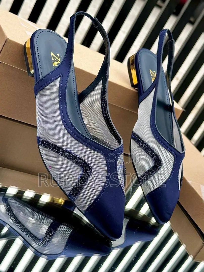 Pointed-Toe Slingback Flats