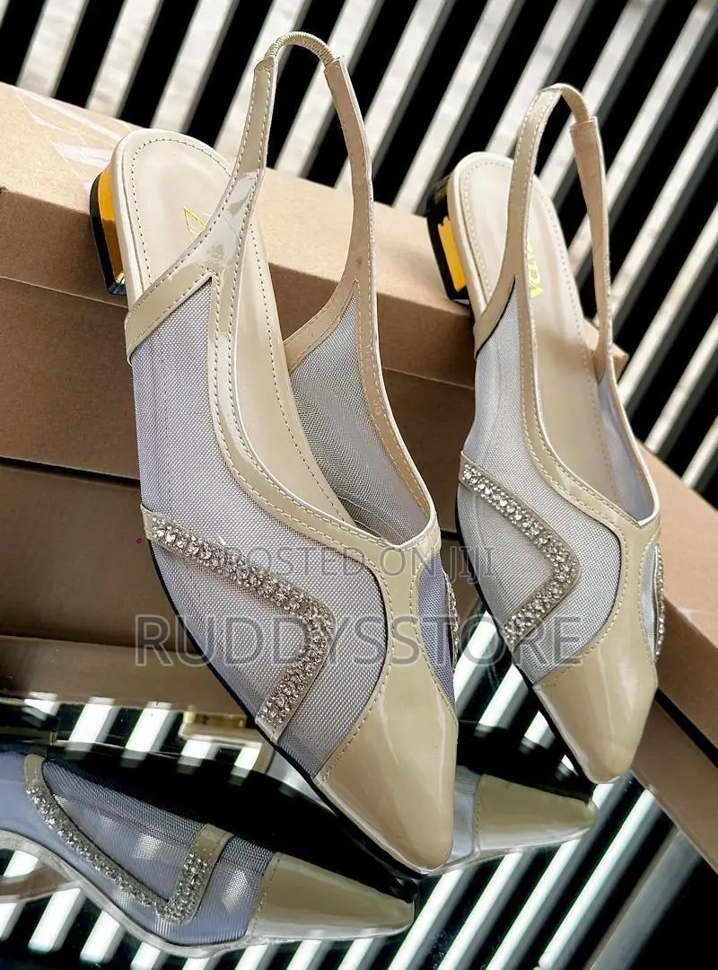 Pointed-Toe Slingback Flats