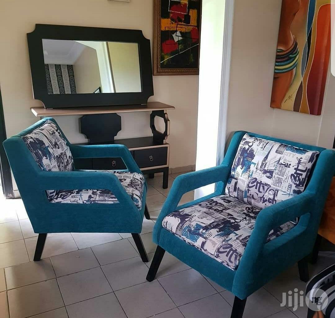 Unique Wooden Made Stand Alone Fabric Made Sofa Chair.