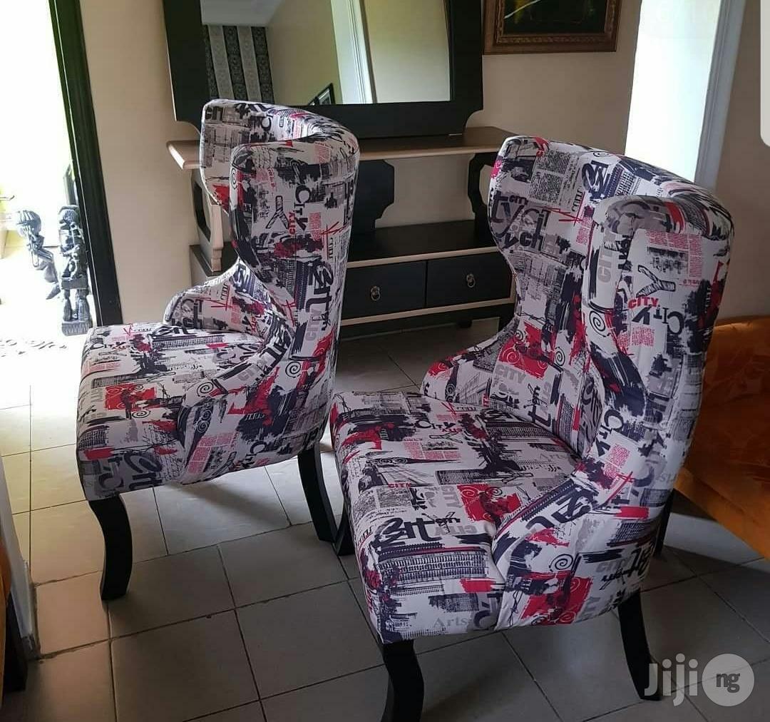 Unique Wooden Made Stand Alone Fabric Made Sofa Chair.