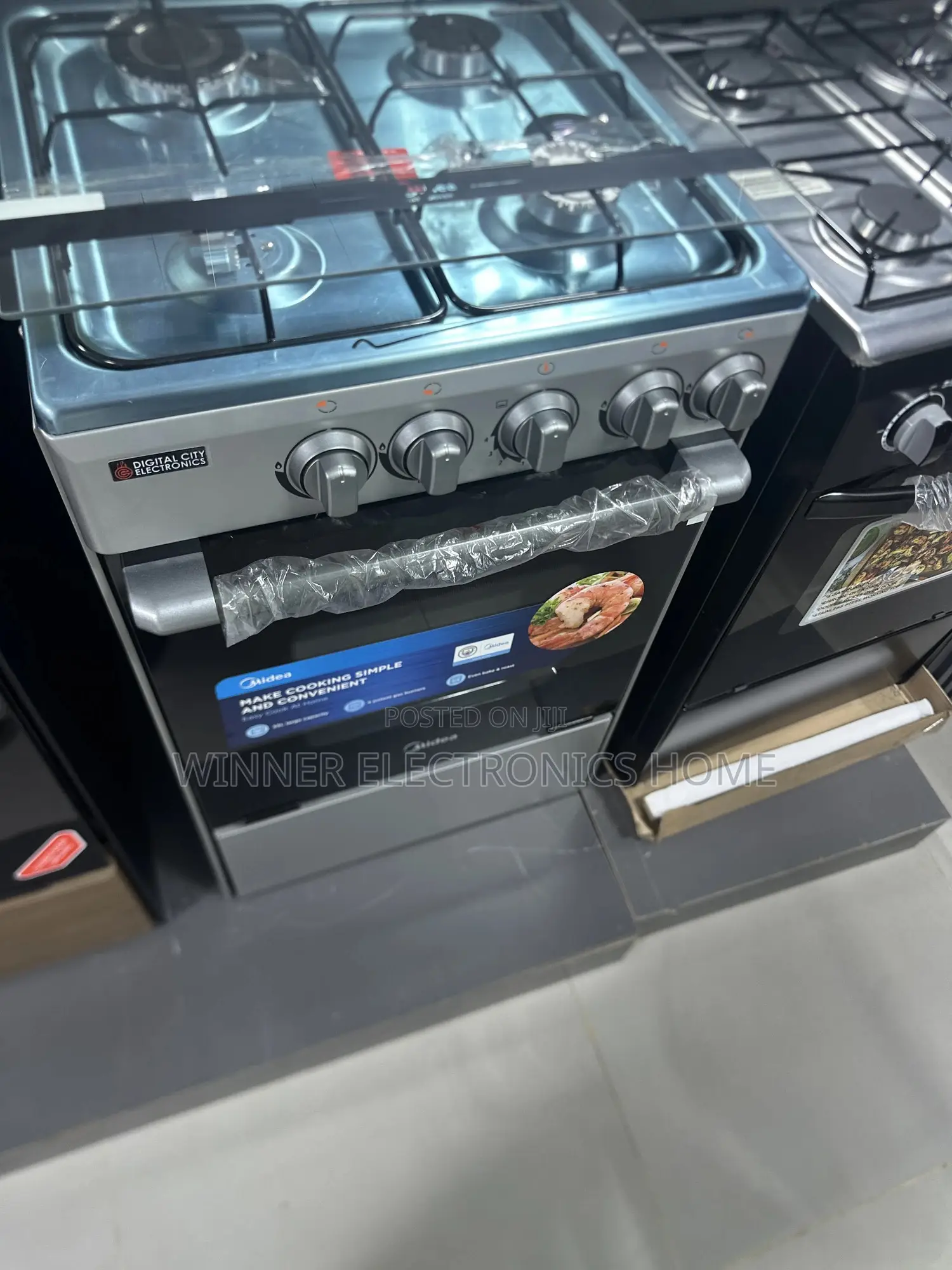 Midea 50 by 50 Standing Gas Cooker 4burner With Grill and Oven