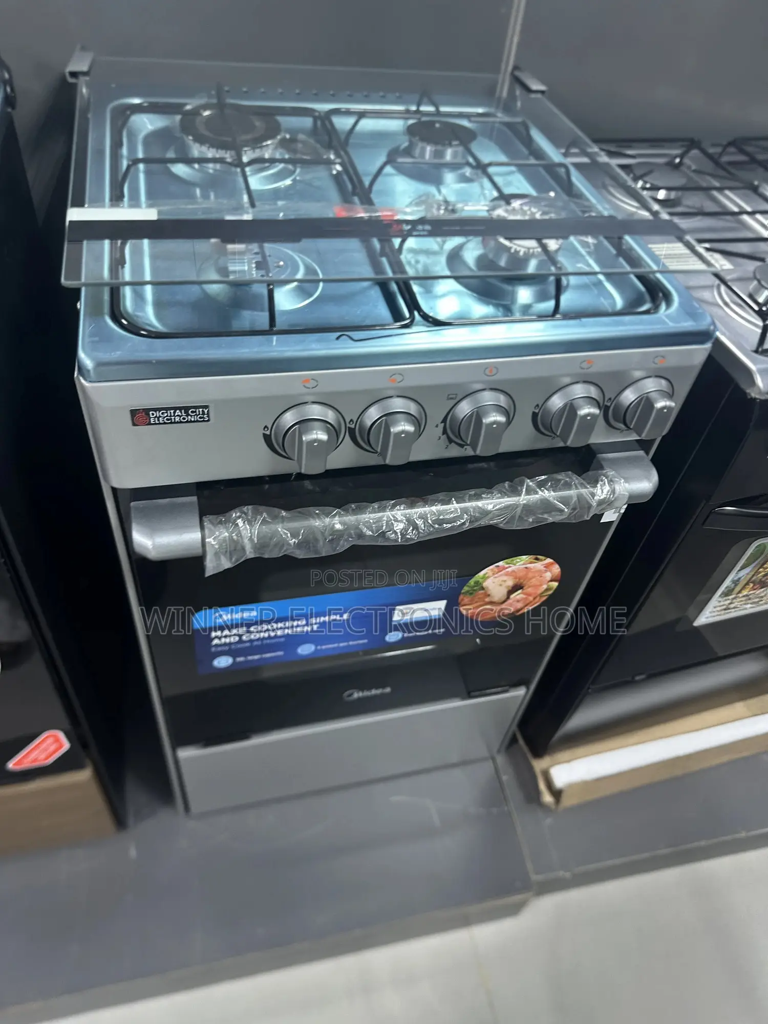 Midea 50 by 50 Standing Gas Cooker 4burner With Grill and Oven