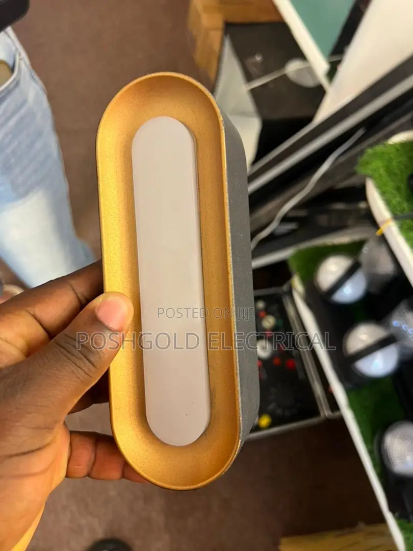 Oval Gold Cast Wall Light