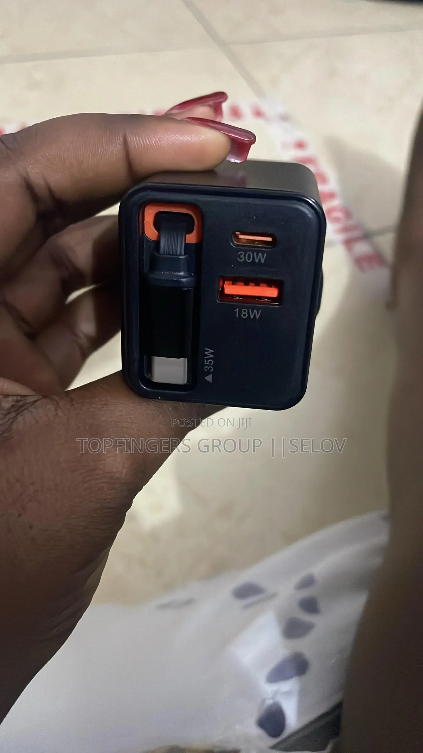 65watts Fast Gan Charger With Inbuilt Magnetic Retractable Cable.