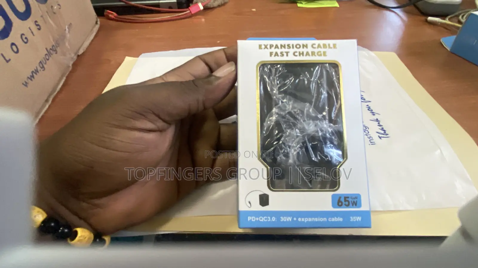 65watts Fast Gan Charger With Inbuilt Magnetic Retractable Cable.
