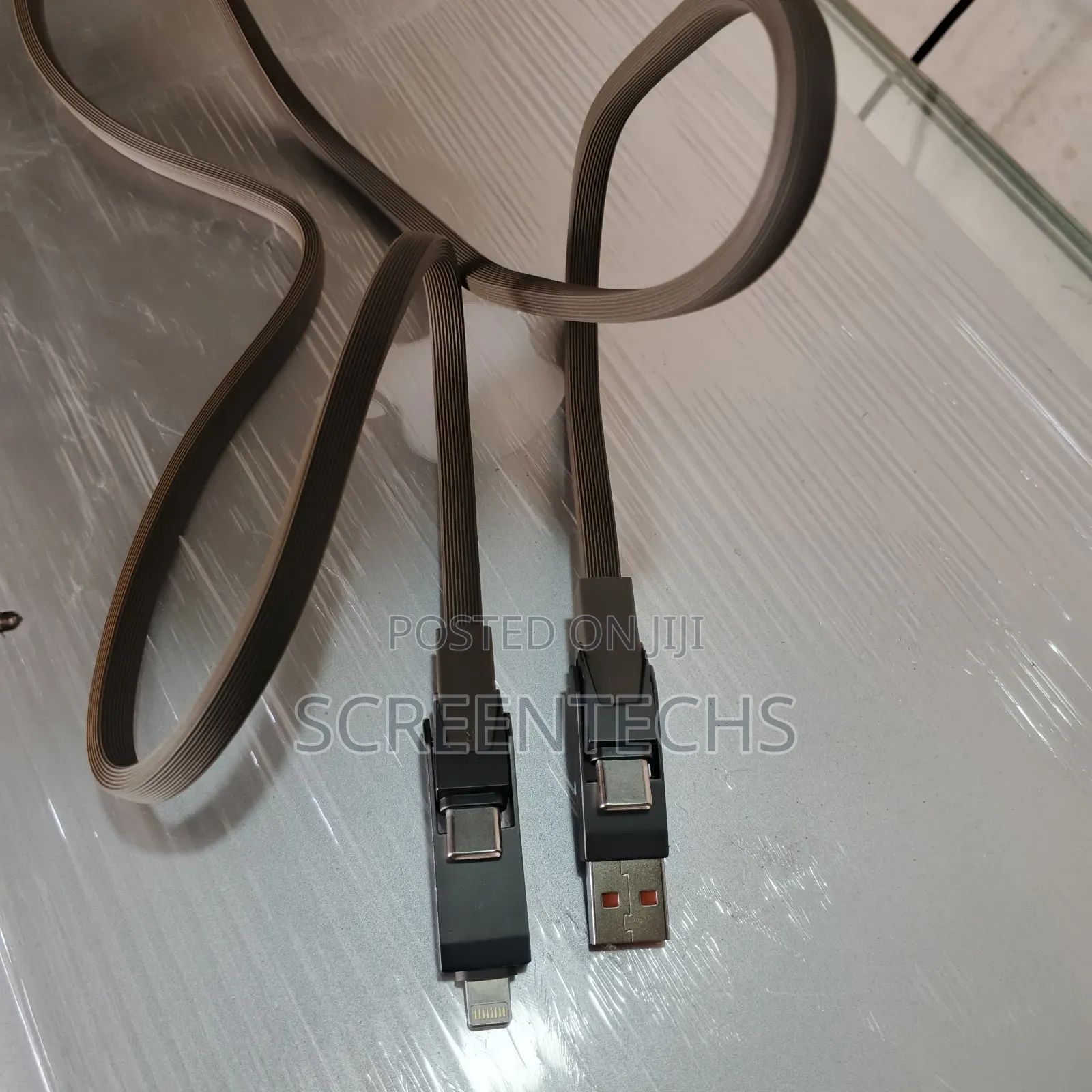 65 Watts Original Newage 4-in-1 Data Charging Cord.