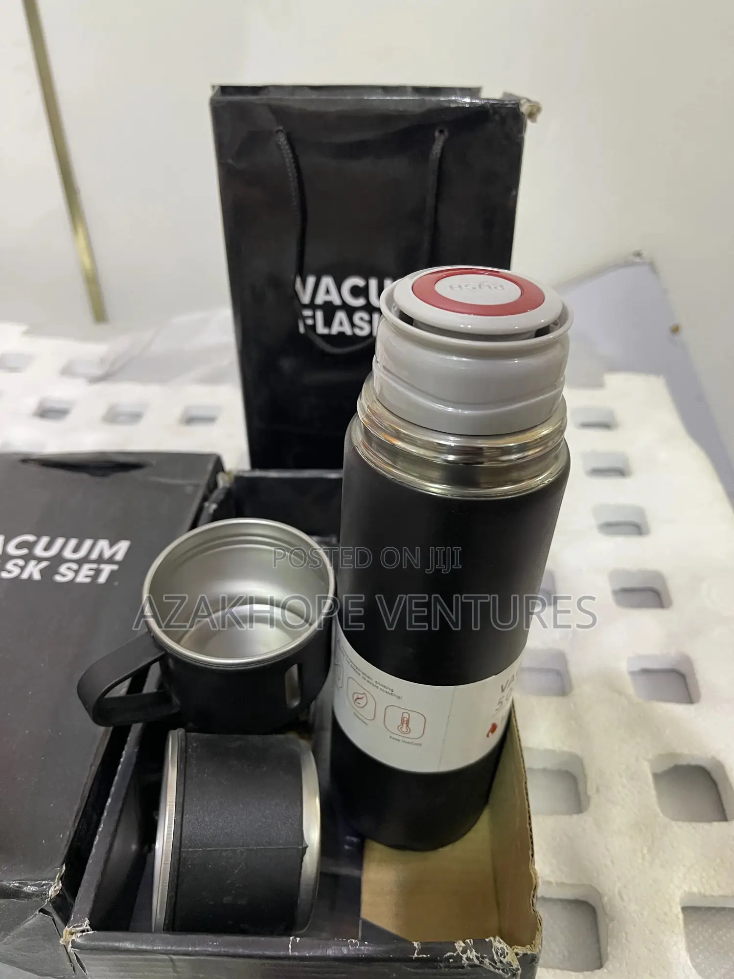 Stainless Steel Vacuum Flask Set With Two Cups.