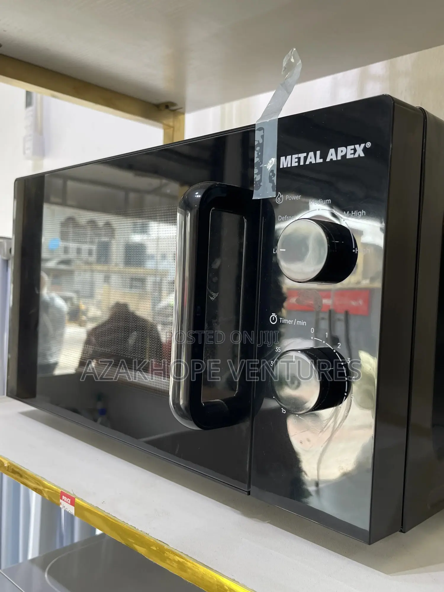 Metal Apex Microwave Oven.