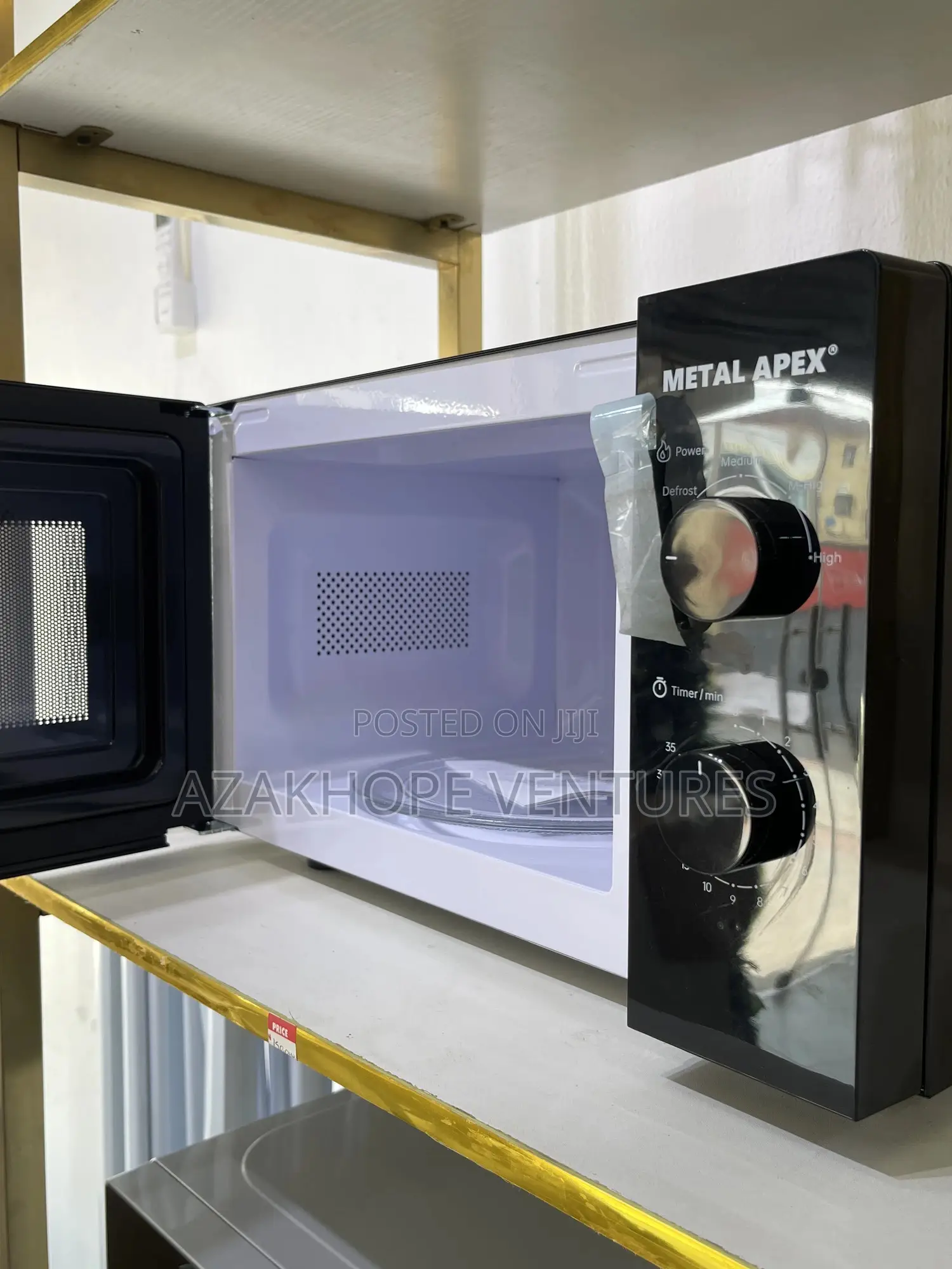 Metal Apex Microwave Oven.