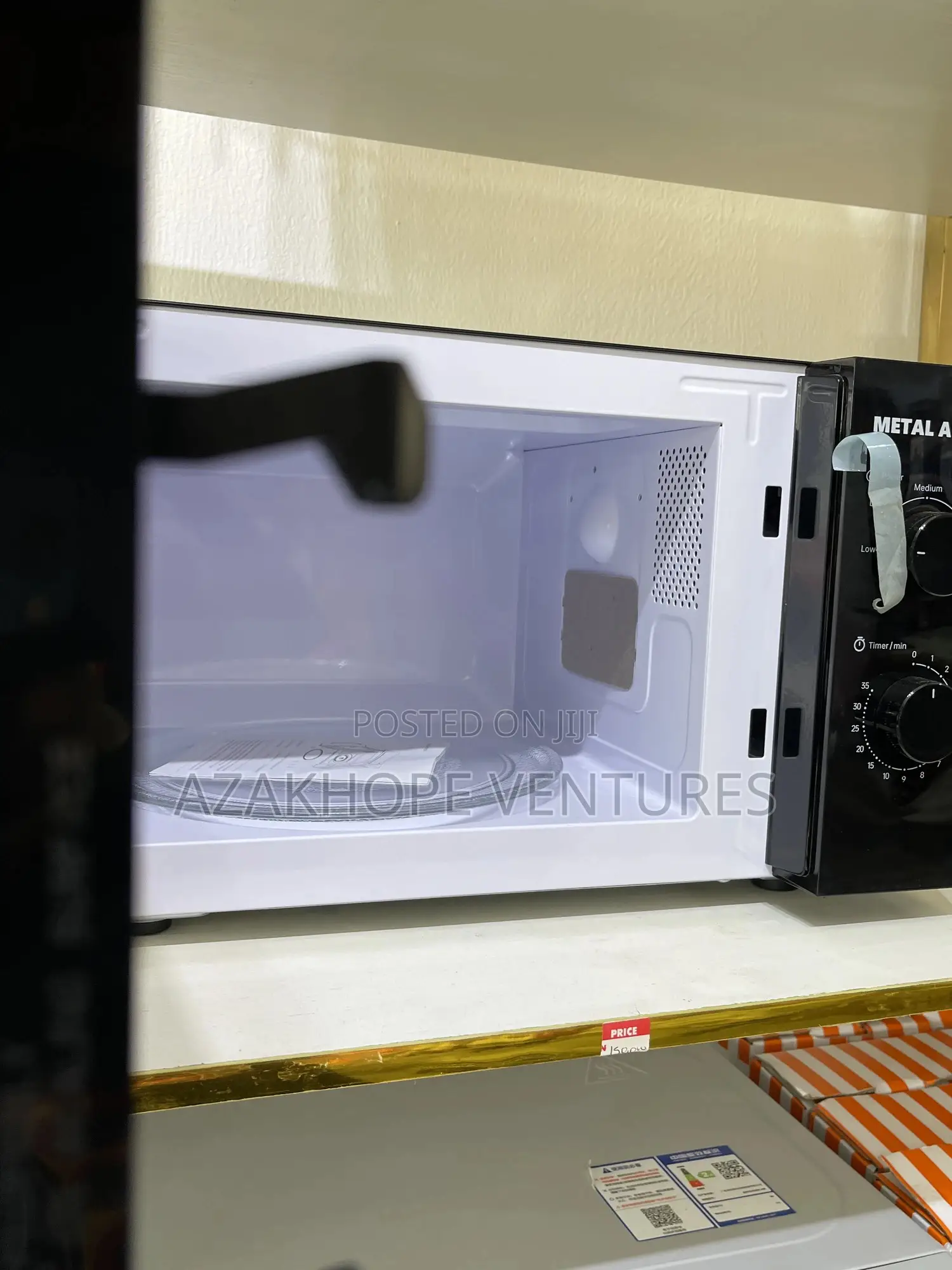 Metal Apex Microwave Oven.