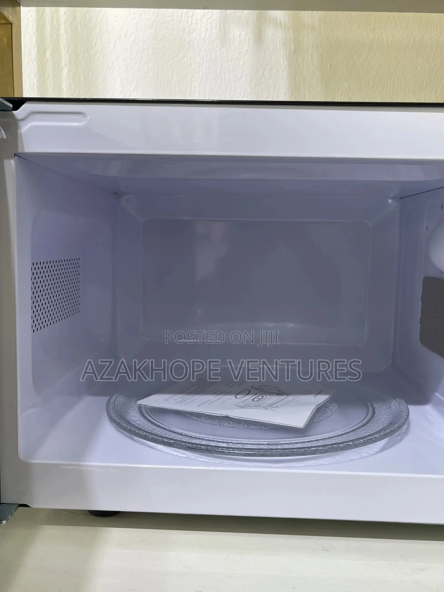 Metal Apex Microwave Oven.