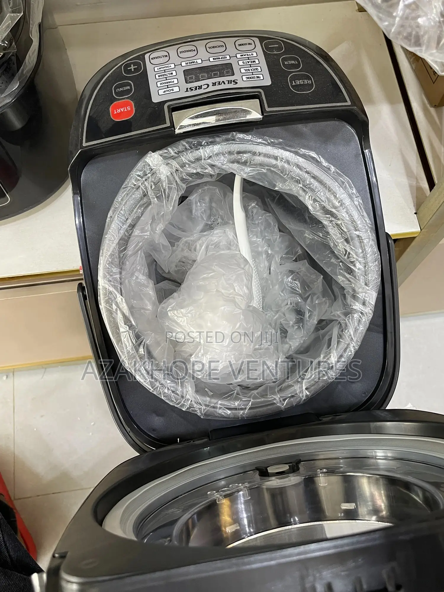 5-Liter Silver Crest Multifunctional Electric Rice Cooker.