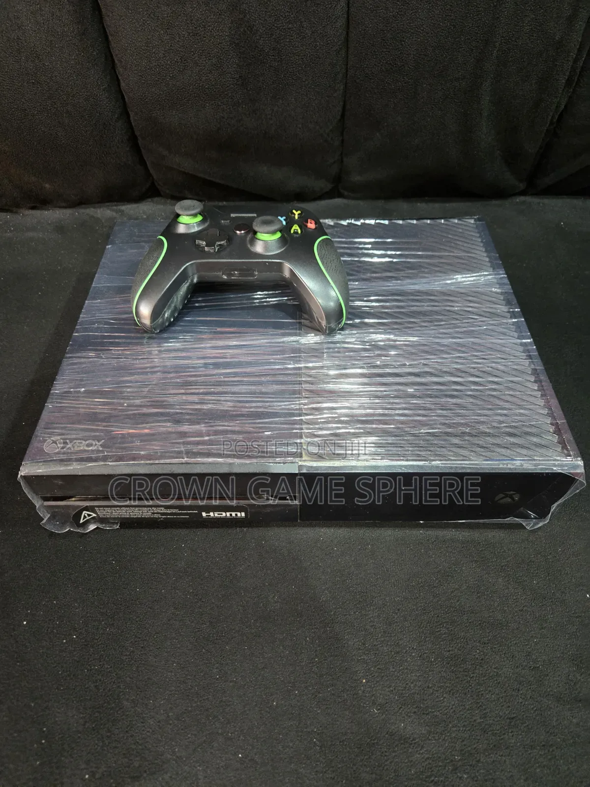 Clean Xbox One With 1 Pad and 2 Games Fc 26 and Wwe 2k25