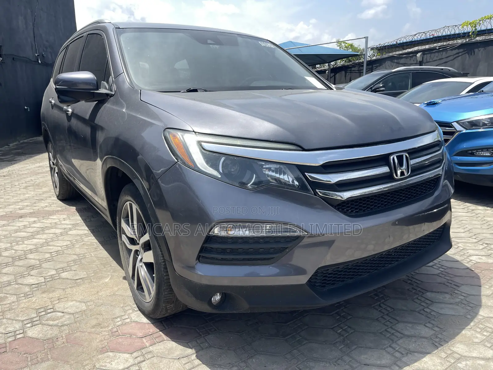 Honda Pilot Touring 4dr SUV 4WD (3.5L 6cyl 9A) 2016 Gray