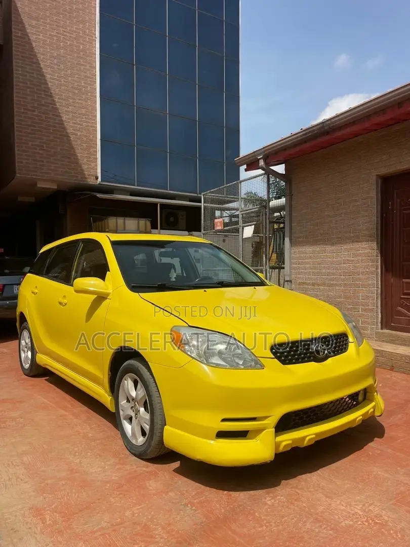 Toyota Matrix XR Hatchback AWD (1.8L 4cyl 4A) 2004 Yellow