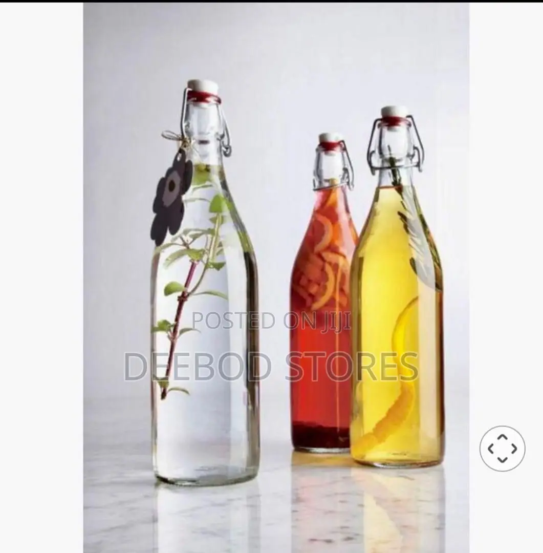 Cello Aquaria Glass Water Bottle With a Swing-Top Lid.