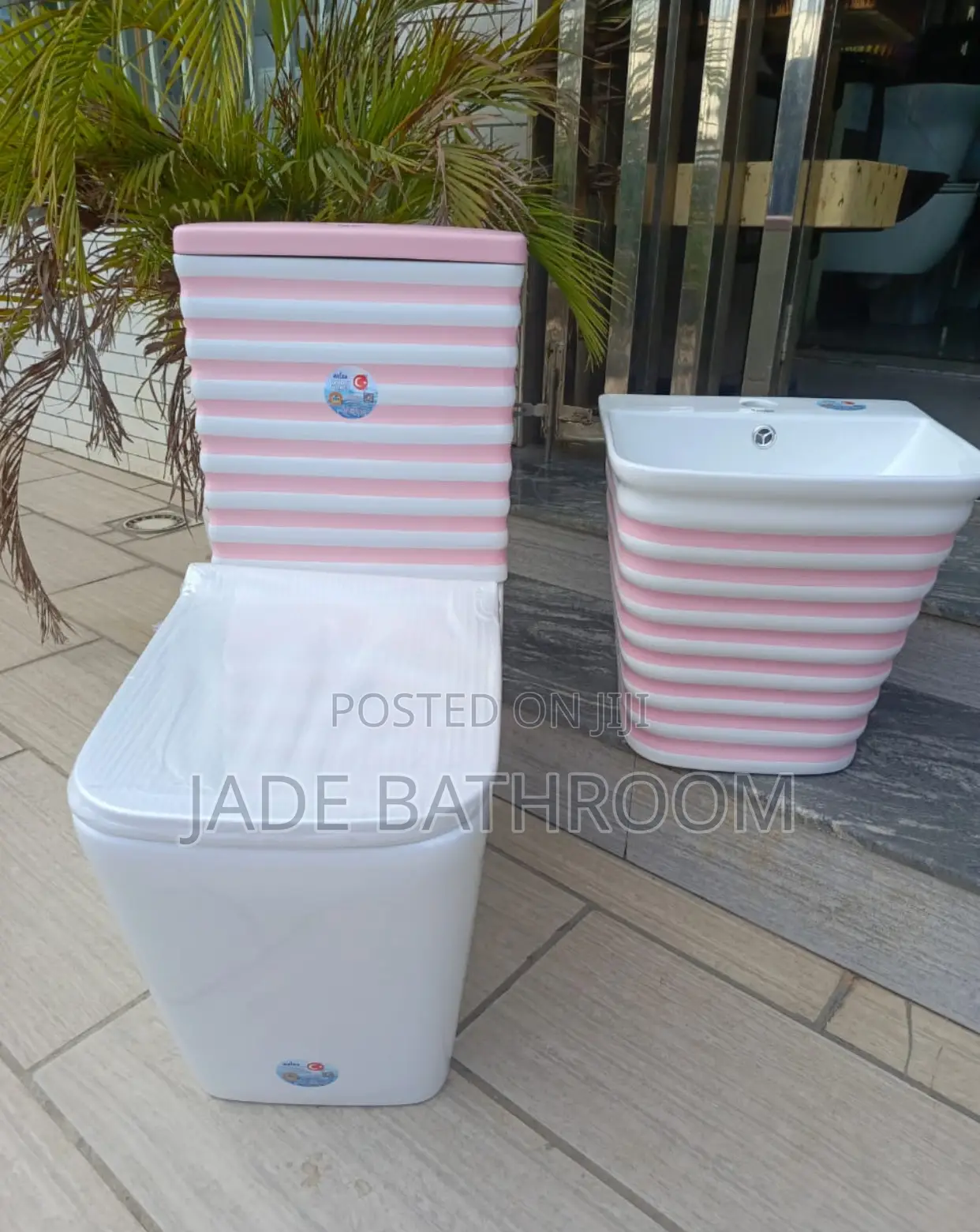 White and Pink Line Water Closet