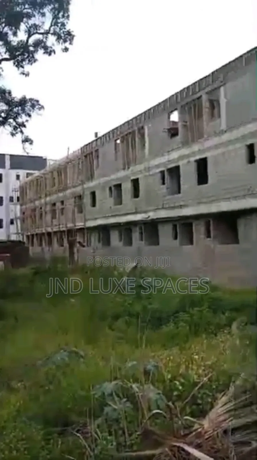 A Vacant Plot of Land Fence and Gated in a Serene Environment