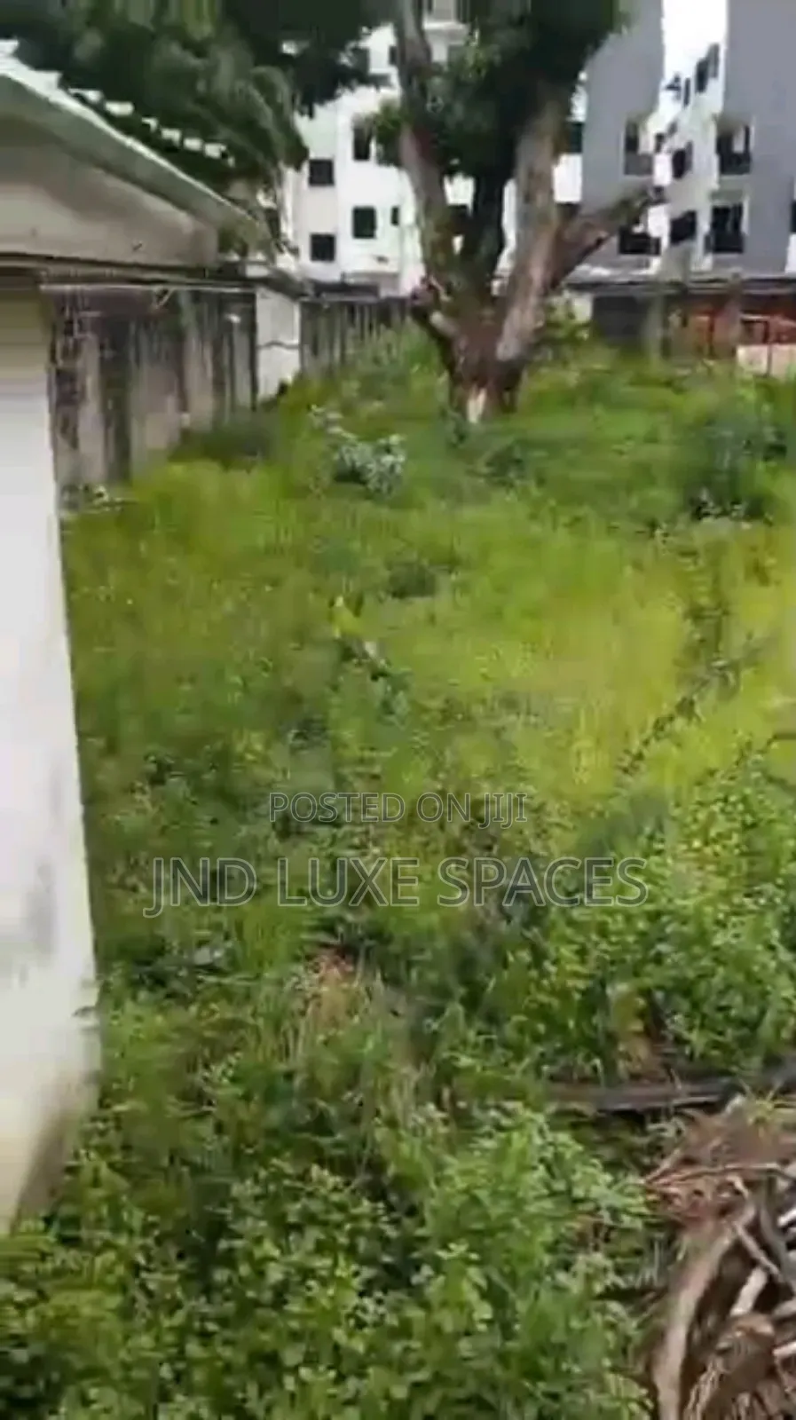 A Vacant Plot of Land Fence and Gated in a Serene Environment