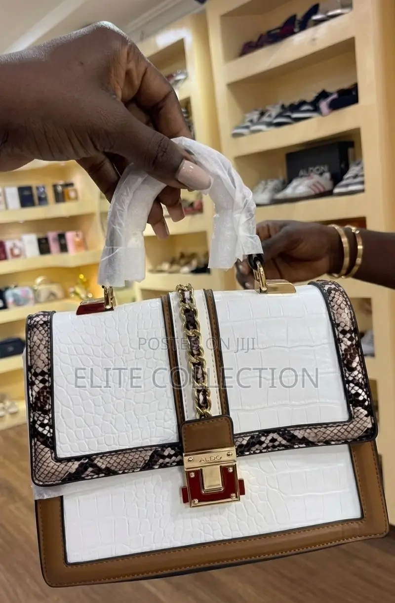The Aldo Martissa Top Handle Bag*Size: Midi* Color: As Displayed*