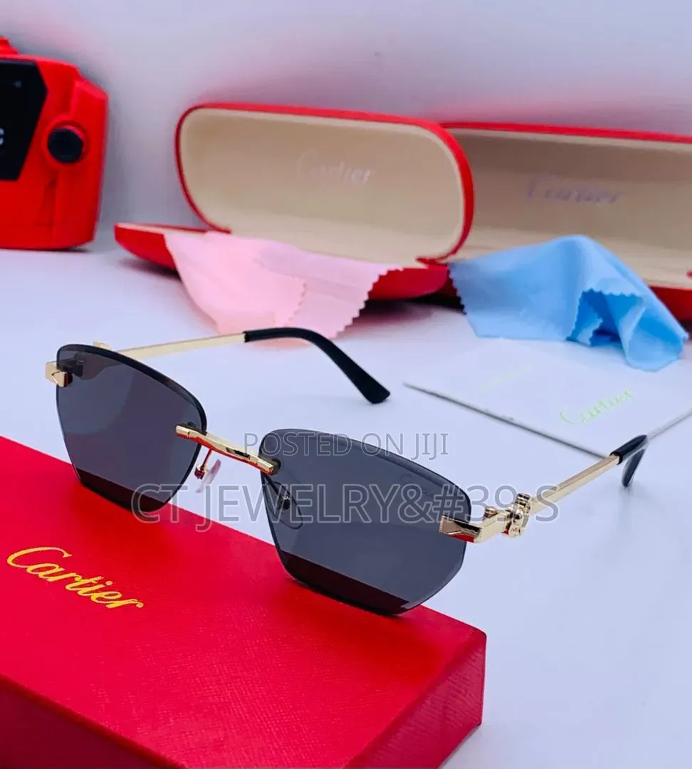 Fashion Cartier Sunglasses Featuring a Silver Frame and Blue Lenses.