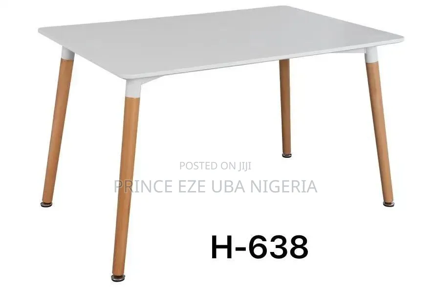 Table With Wooden Legs and Iron Leg