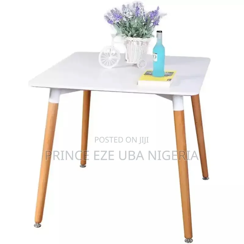 Table With Wooden Legs and Iron Leg