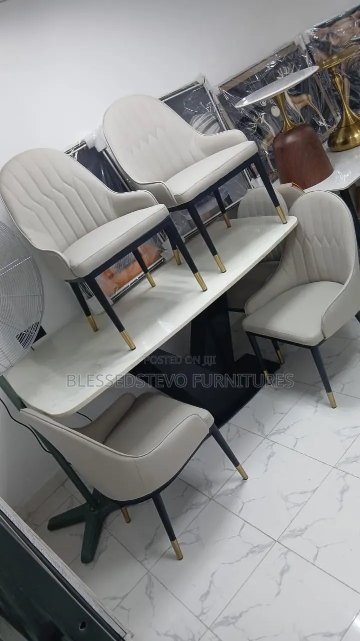 Cream Dining Table With 6 Chair's