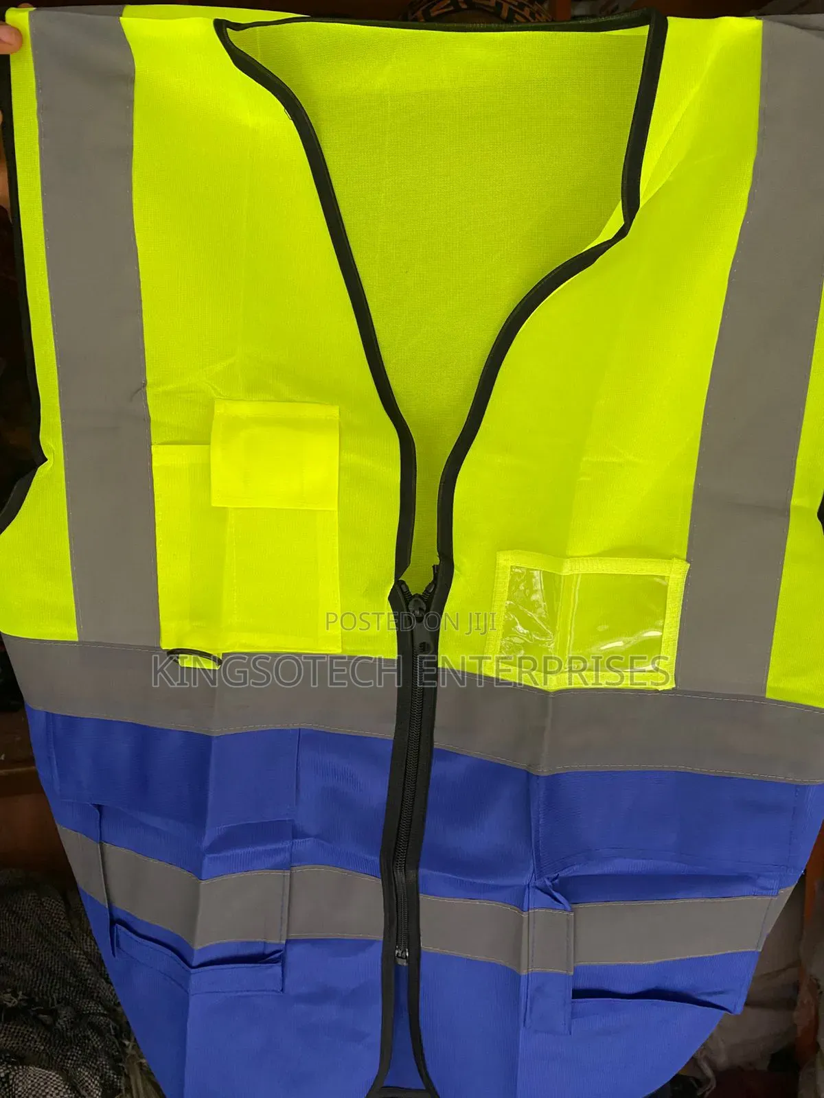 Reflective Jacket Blue Green And Orange Colors