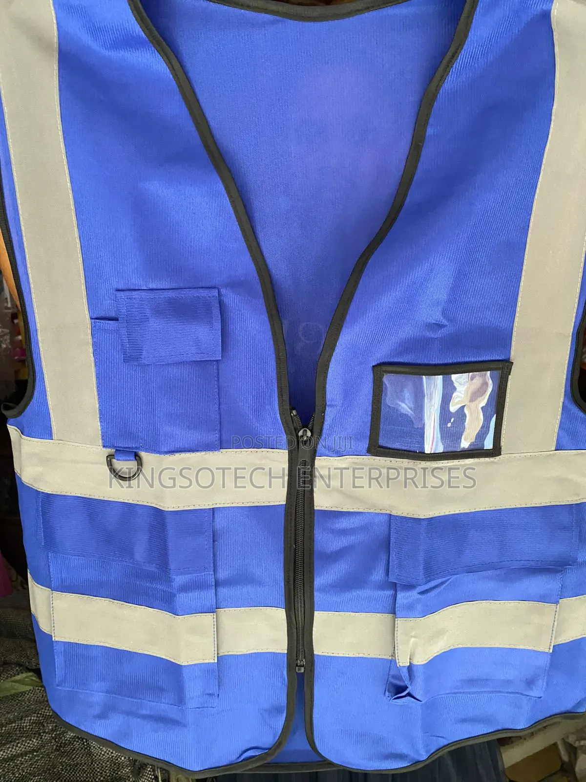 Reflective Jacket Blue Green And Orange Colors