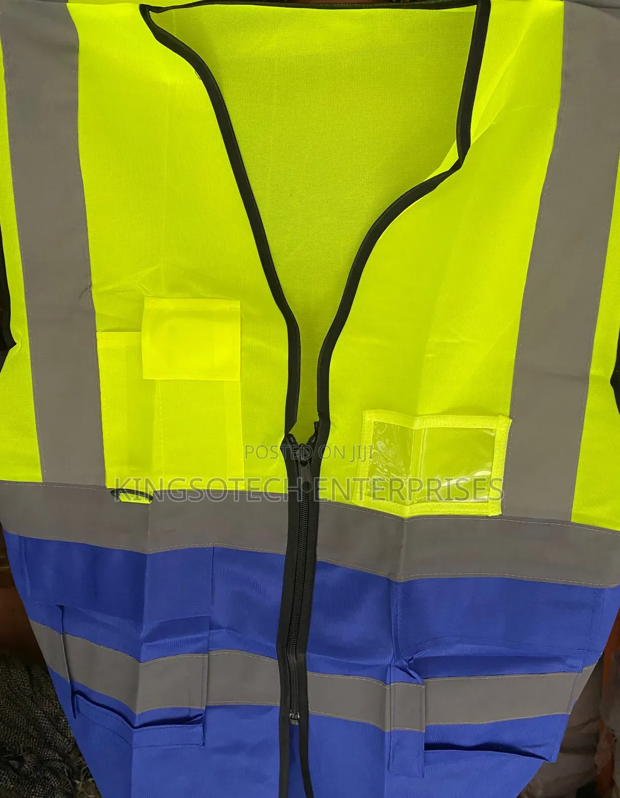 Reflective Jacket Blue Green And Orange Colors
