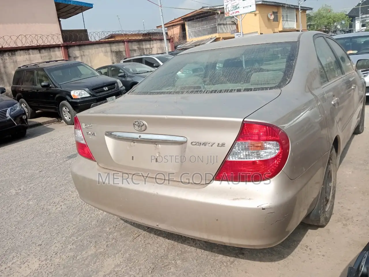 Toyota Camry LE 4dr Sedan (2.4L 4cyl 5M) 2003 Gold