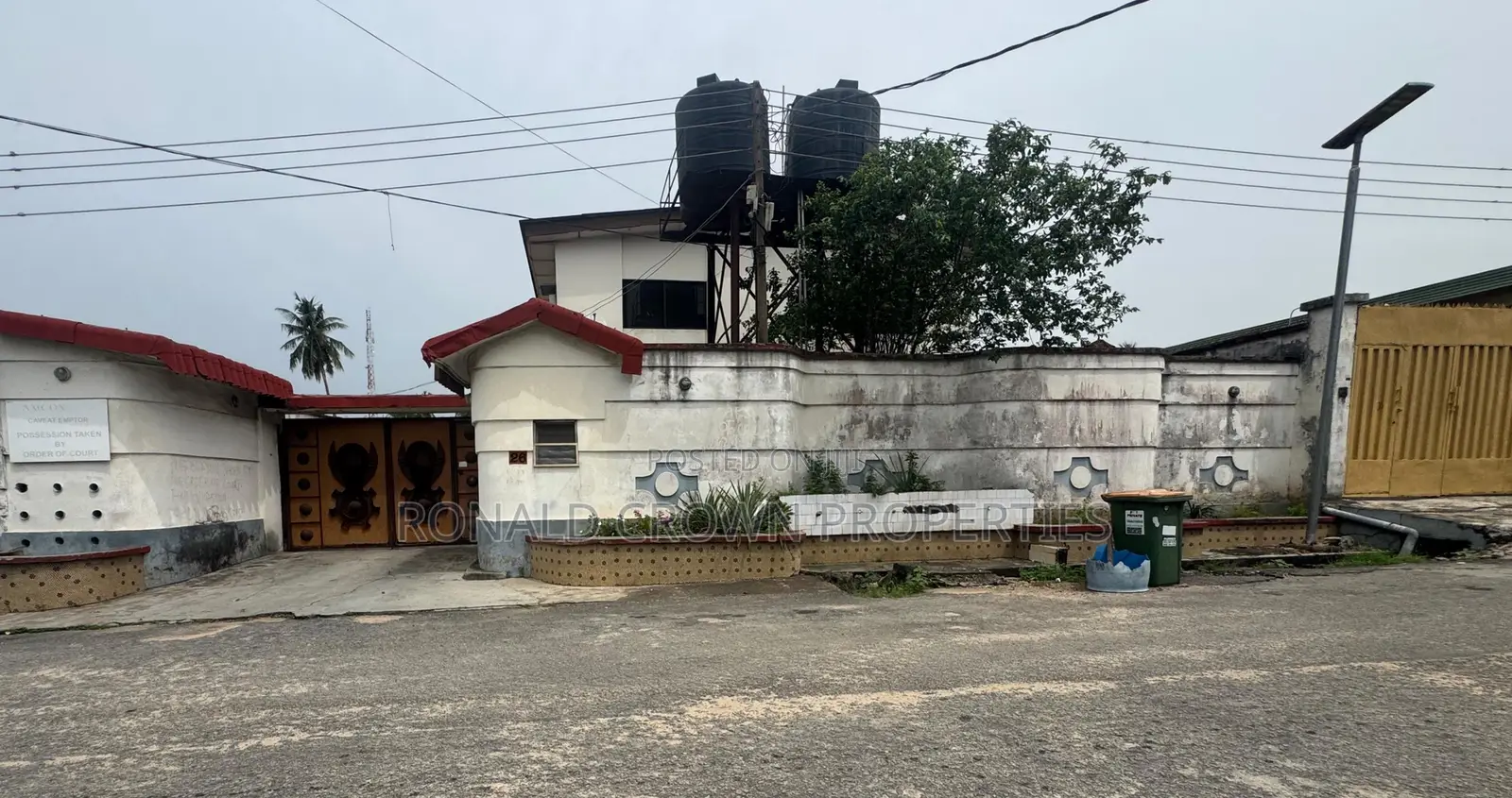 Land Measuring 1000sqm With Demolishable Building at Ikeja